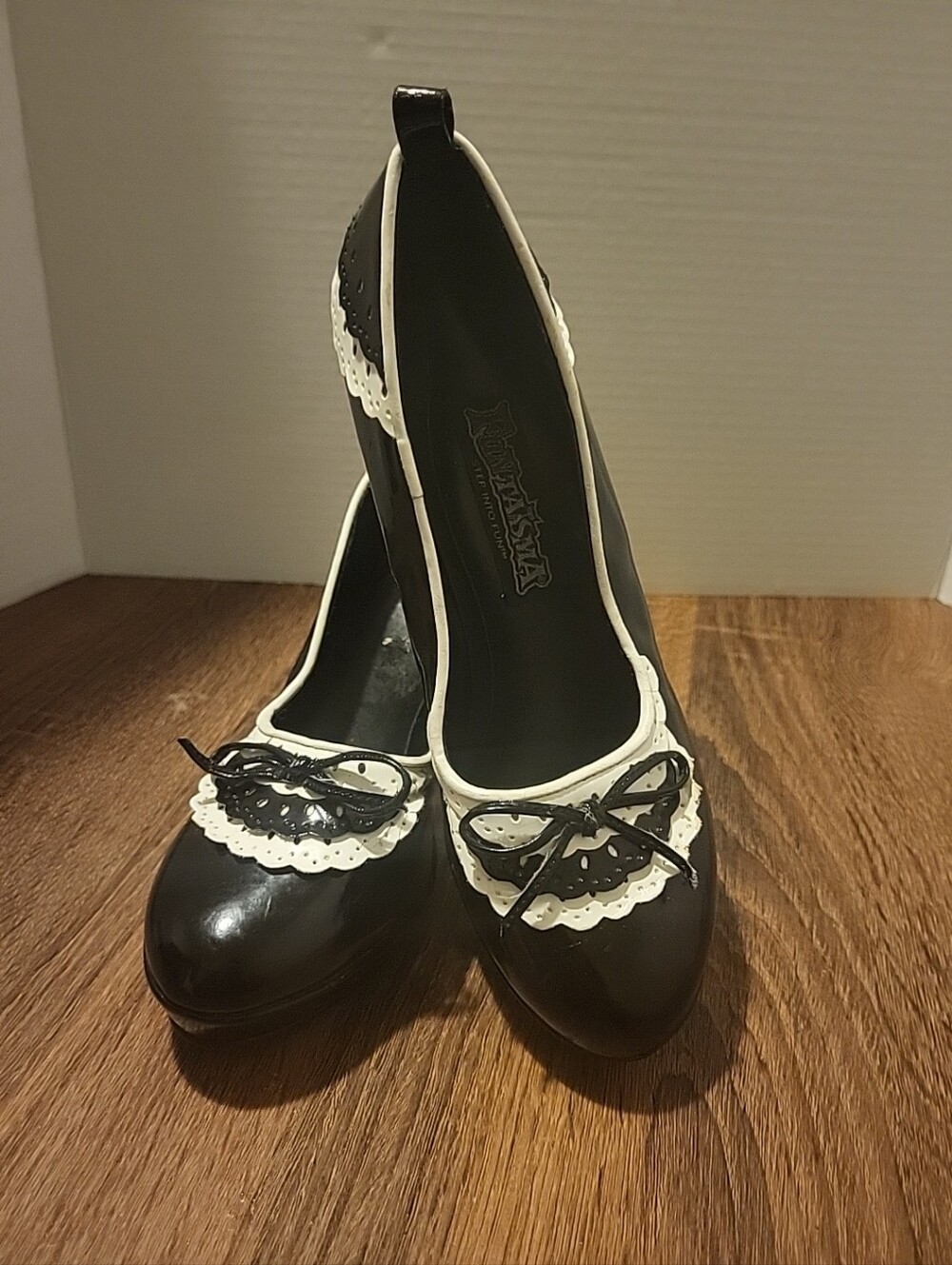Nella Fantasia Black and White Lace-Trim Heels